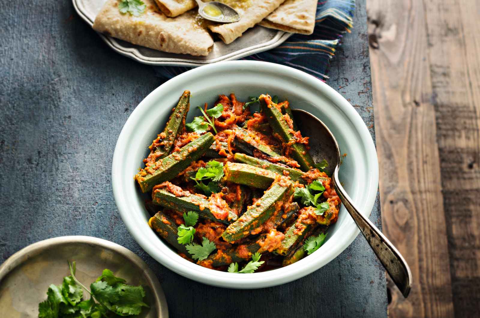 Two phulka with bhindi masala and dal